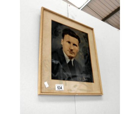 A framed and glazed portrait