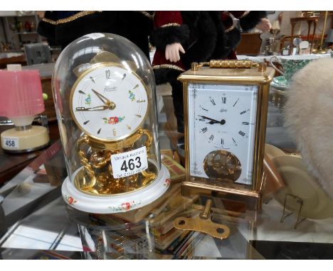 An anniversary clock and a carriage clock