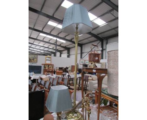 A standard lamp and a table lamp with matching shades