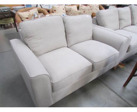 A superb quality beige 2 seater sofa