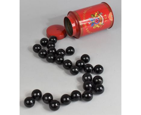 A Modern Red Enamelled tea Caddy Containing Balls 