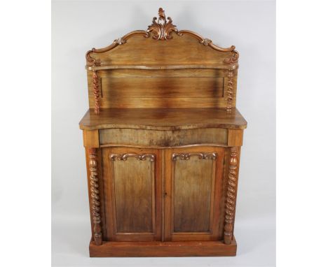 A Late Victorian Mahogany Serpentine Front Chiffonier with Barley Twist Pilasters and Panelled Doors, Centre Long Drawer and 