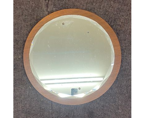 Vintage teak framed beveled edge mirror measures approx 23 inches diameter 