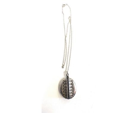 Antique vintage locket in unmarked silver 