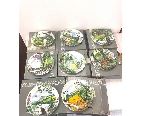 Selection of 8 boxed wedgewood collectors plates 