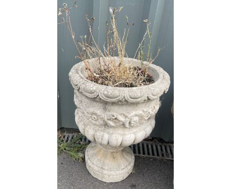 Concrete garden planter measures approx 18 inches tall 
