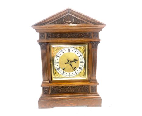 Oak 2 key hole carved bracket clock, with key and pendulum untested 