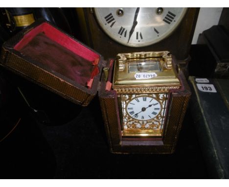 FRENCH 19TH CENTURY BRASS AND GILT CARRIAGE CLOCK, ORIGINAL CASE WITH KEY