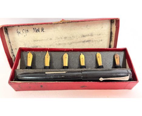 A boxed vintage Osmorid calligraphy set