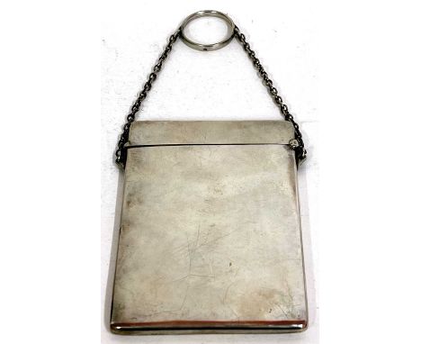 A George V silver card case of plain polished form with chain and ring handle, Birmingham 1915, makers mark William Neale &am