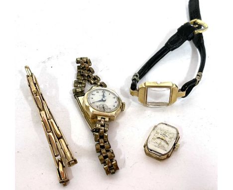 A lot of two 9ct gold cased ladies wrist watches and yellow metal expanding bracelet which is stamped 9ct on a link, one of t