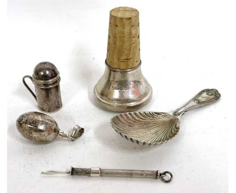 Mixed lot to include a silver cased toothpick, a white metal and cork bottle stopper, plated shell bowled caddy spoon,  a mod