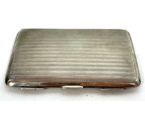 A George V silver card case with engine turned line decoration, Birmingham 1910, makers mark for William Neale, 111.4gms