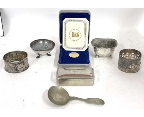 Mixed Lot:  A Victorian silver trench salt on four ball feet, no liner, a Victorian serviette ring, a plated caddy spoon and 