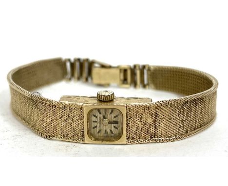 A 9ct gold ladies Rotary wrist watch, the watch is hallmarked on the inside of the case back and again on the bracelet clasp,