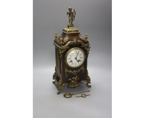  A 19th century French ormolu mounted boulle mantel clock, with key and pendulum, height 40cm