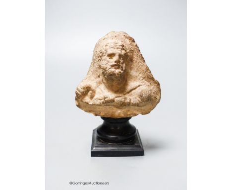   An Etruscan terracotta bearded portrait bust, height 12.5cm