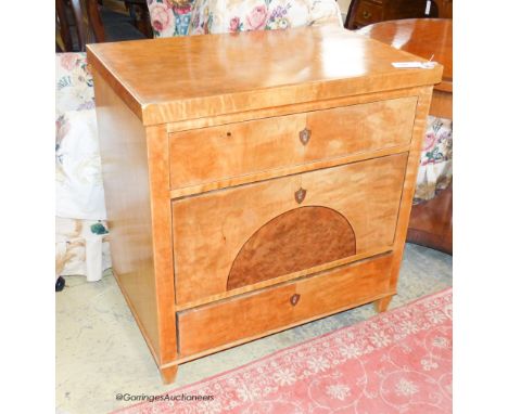   A Biedermier birch three drawer commode, W.75cm D.47cm H.77cm