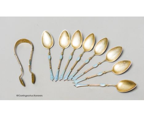   A set of eight Norwegian white metal and enamel coffee spoons and sugar tongs, by Marius Hammer, tongs only marked, gross 3