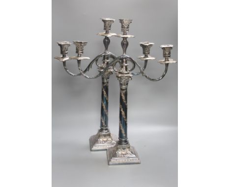   A pair of Georgian style plated two-branch three-light candelabra, height 53cm