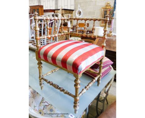   A late Victorian giltwood bobbin turned corner chair