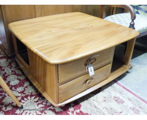   An Ercol elm Windsor storage coffee table, width 78cm, depth 78cm, height 40cm