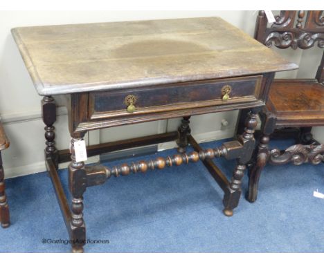   A Charles II rectangular oak side table on bobbin-turned legs and stretchers, width 95cm, depth 59cm, height 75cm