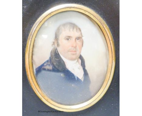   A 19th century portrait miniature, study of a gentleman, in blue tunic with white collar and striped shirt