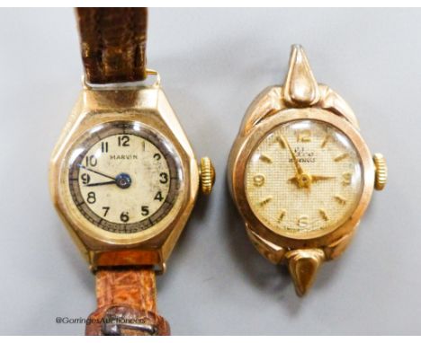   Two lady's 9ct gold cased manual wind wrist watches, including Marvin, one with no strap, gross 18.3 grams.
