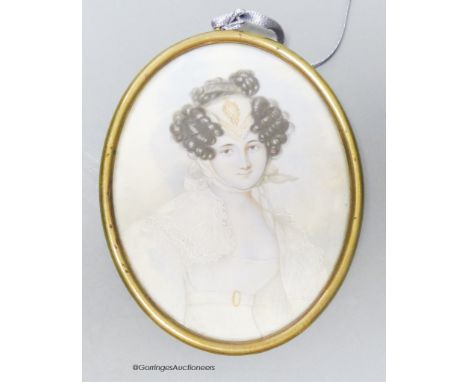   A 19th century portrait miniature, study of a young woman, her hair in ringlets, wearing a lace headdress and white dress