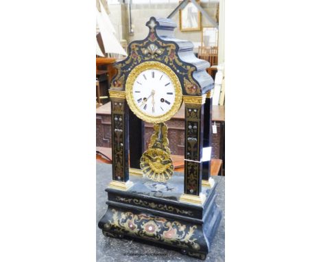   A 19th century French mantel clock, height 58cm