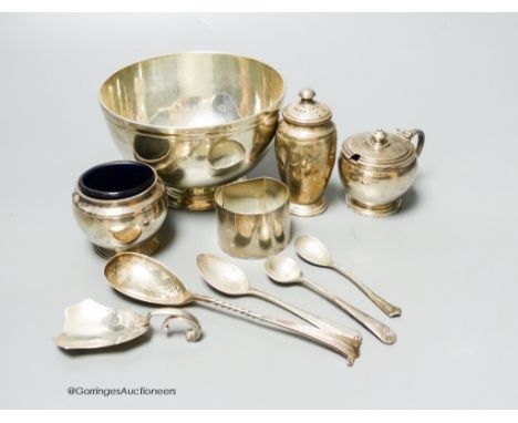   A small collection of English silver and plate to include a footed bowl, mustard pot and salt, napkin ring, caddy spoon, pe