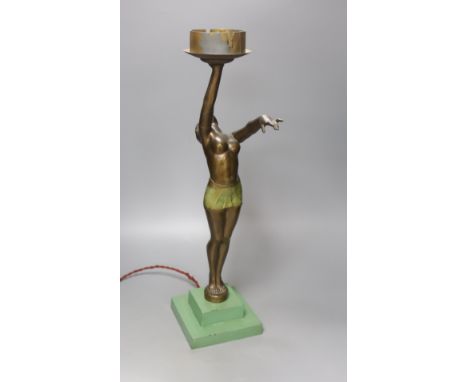   An Art Deco patinated spelter figural lamp, overall height 50cm