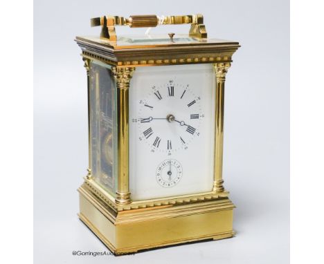   A French lacquered brass repeating carriage clock, height 17cm