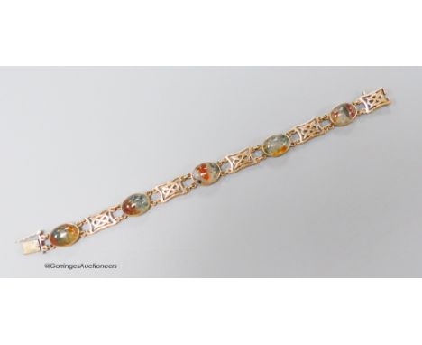   A modern 9ct gold and five stone oval cabochon moss agate and gate link set bracelet, 18.3cm, gross weight 16.9 grams.