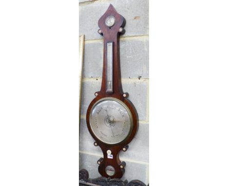   A Victorian rosewood wheel barometer, height 106cm