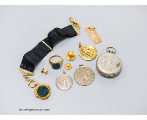   A 1960's 9ct gold and bloodstone set signet ring, size O, a Victorian 9ct gold and chalcedony set swivelling fob seal on a 