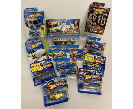 12 Hot Wheels 1:72 scale diecast vehicles. All still sealed in original packaging.  To include: Happy New Year 2016 Carbonato