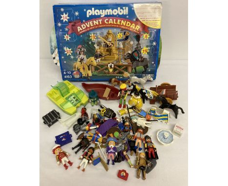 A box of Playmobil figures, accessories and animals.  Together with a Playmobil "Knights" advent calendar a/f. 
