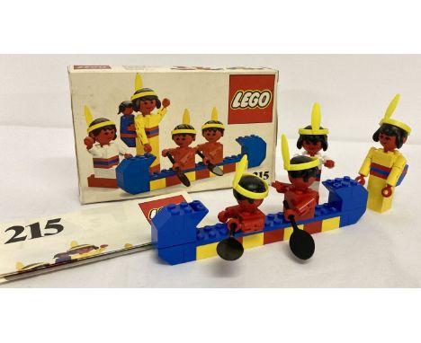 A boxed Vintage 1977 Lego #215 Red Indians set, complete with instructions.  Complete except for baby. 
