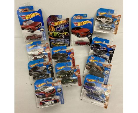 12 Hot Wheels 1:72 scale diecast vehicles. All still sealed in original packaging.  To include: HW Showroom No. 3, 5 &amp; 10