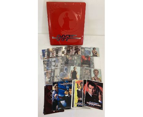 A folder containing a quantity of Inkworks 007 Tomorrow Never Dies trading cards.  Contains: 2 full sets of 90 cards, 1 nearl