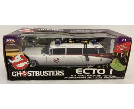 A boxed Ertl 1:21 scale diecast collectors model of Ghostbusters Ecto 1 ambulance vehicle, 2004.  Slimer missing, interior pa