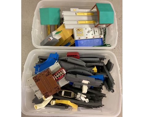 2 boxes of Thomas The Tank Engine track, buildings and vehicles by Tomy.  Vehicles include Harold, Bulstrode the Barge and Bu
