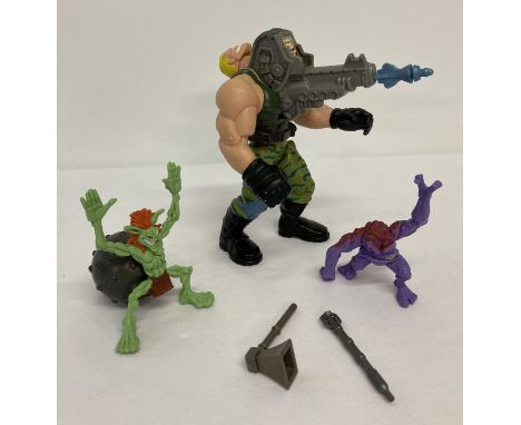 A 1998 Small Soldiers 6 inch "Brick Bazooka" Commando Elite action figure.   With rotating head and missile. Together with 2 