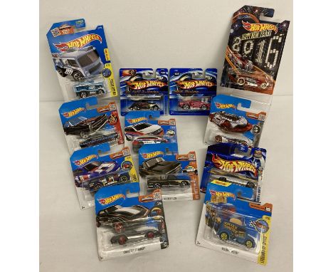 12 Hot Wheels 1:72 scale diecast vehicles. All still sealed in original packaging.  To include: Happy New Year 2016 Carbonato
