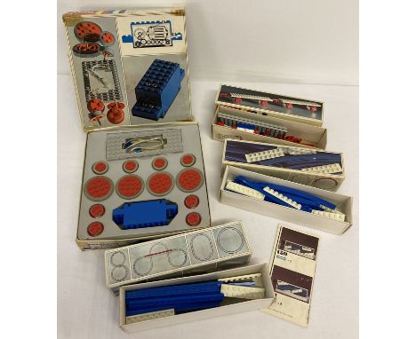 A vintage boxed Lego 4 wheel drive motor #100, complete with instructions.  Together with 3 vintage Lego system boxed kits: #