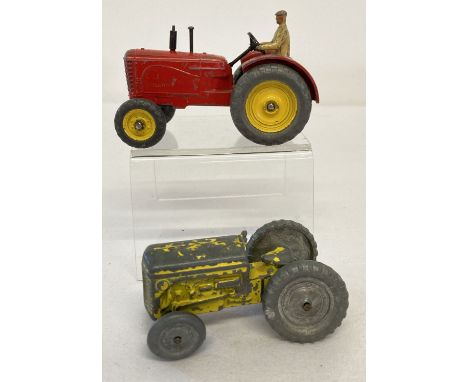 A Dinky 27a Massey Harris tractor, 1948-54 together with Benbros Ferguson Tractor.   Dinky - red with grey metal tyres, yello