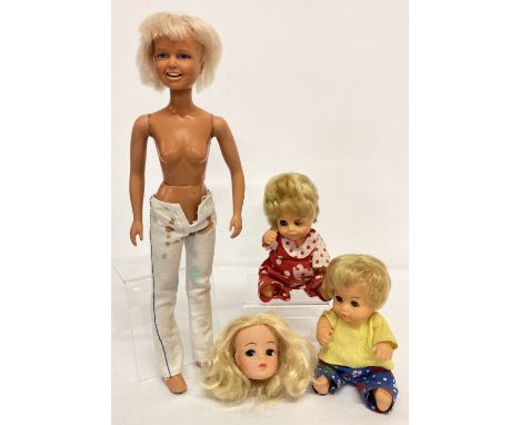A pair of vintage Christopher and Carrie dolls in original outfits.  Together with a 1974 Dusty doll (a/f) and a vintage Sind