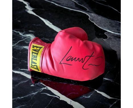 Lennox Lewis signed red Everlast boxing glove. Lennox Claudius Lewis CM CBE (born 2 September 1965) is a boxing commentator a